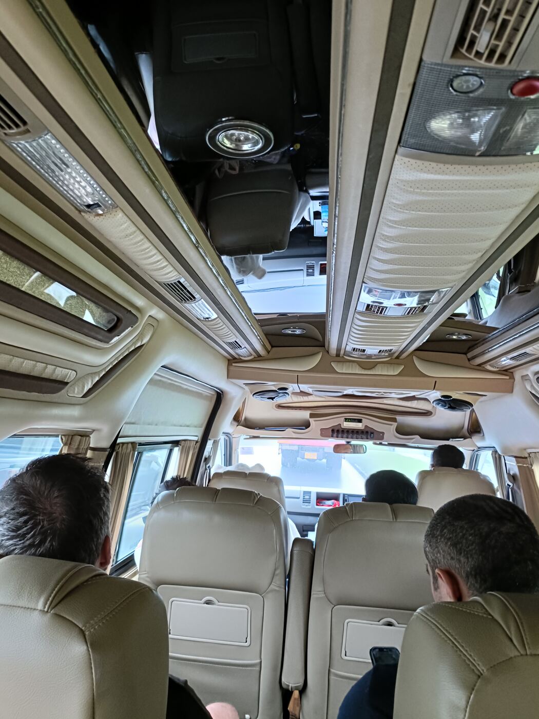 Inside the minivan, passengers seated ahead